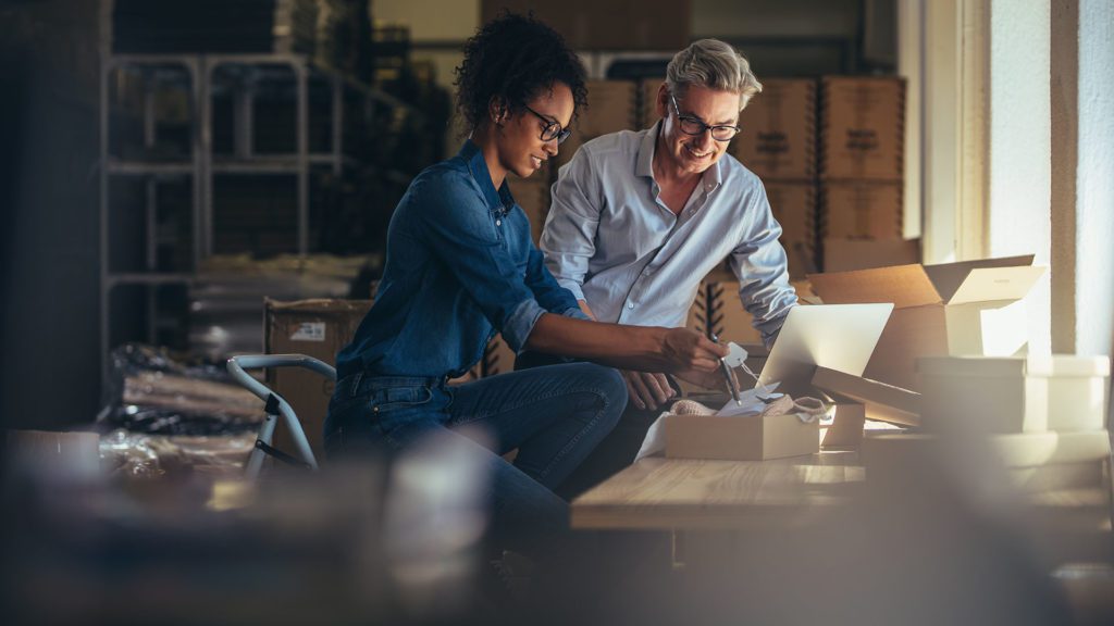 two small business owners talk strategy